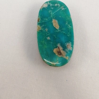 تصویر 1 از سنگ فیروزه سبز آبی با رنگ سبز آبی چشم‌ نواز و شفاف